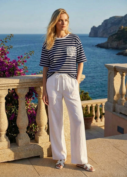 T-shirt a righe con tasca in pizzo