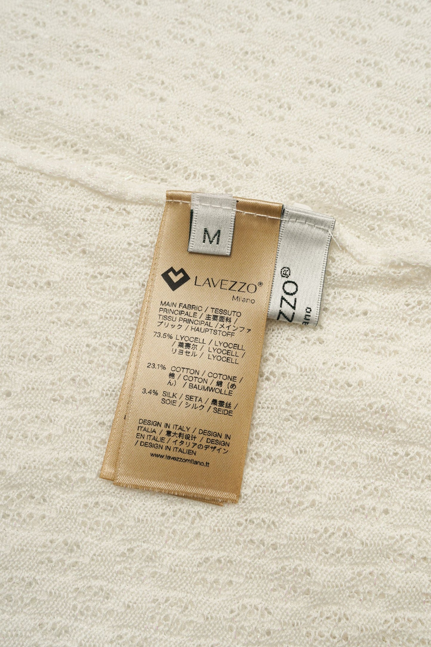 LAVEZZO Top in maglia traforata con micro-luce e manica a cappuccio