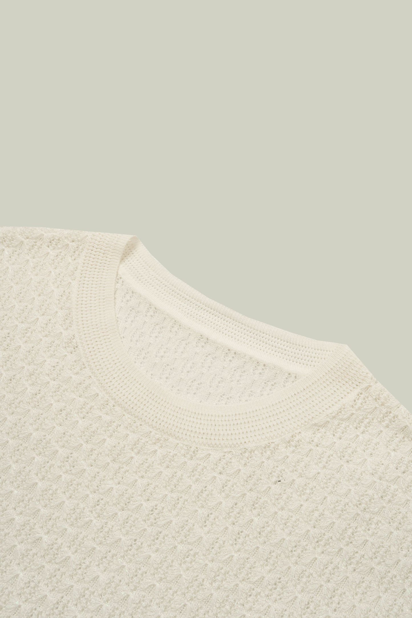 LAVEZZO Top in maglia traforata con micro-luce e manica a cappuccio