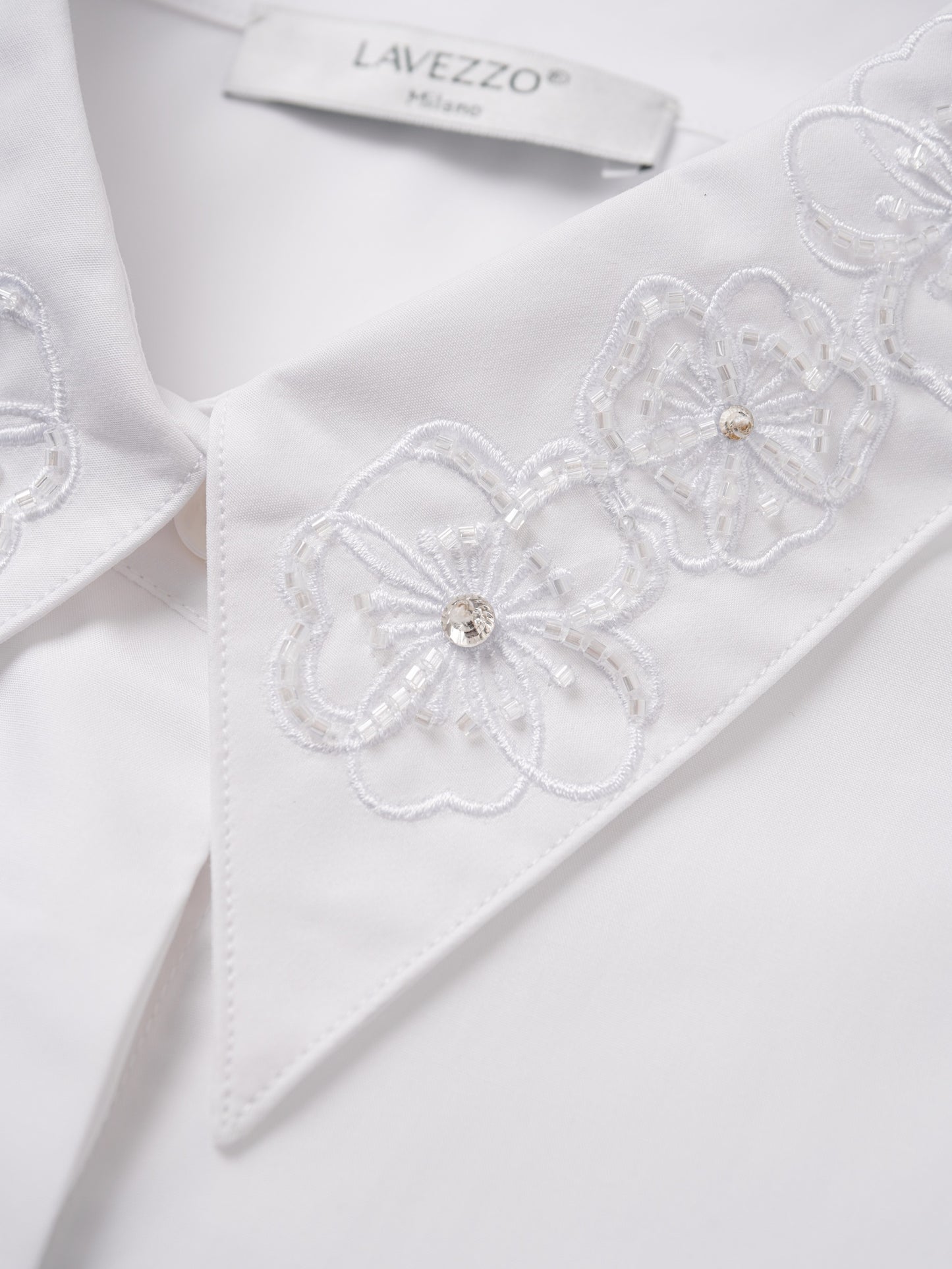  Cotton white shirt with floral embroidery
