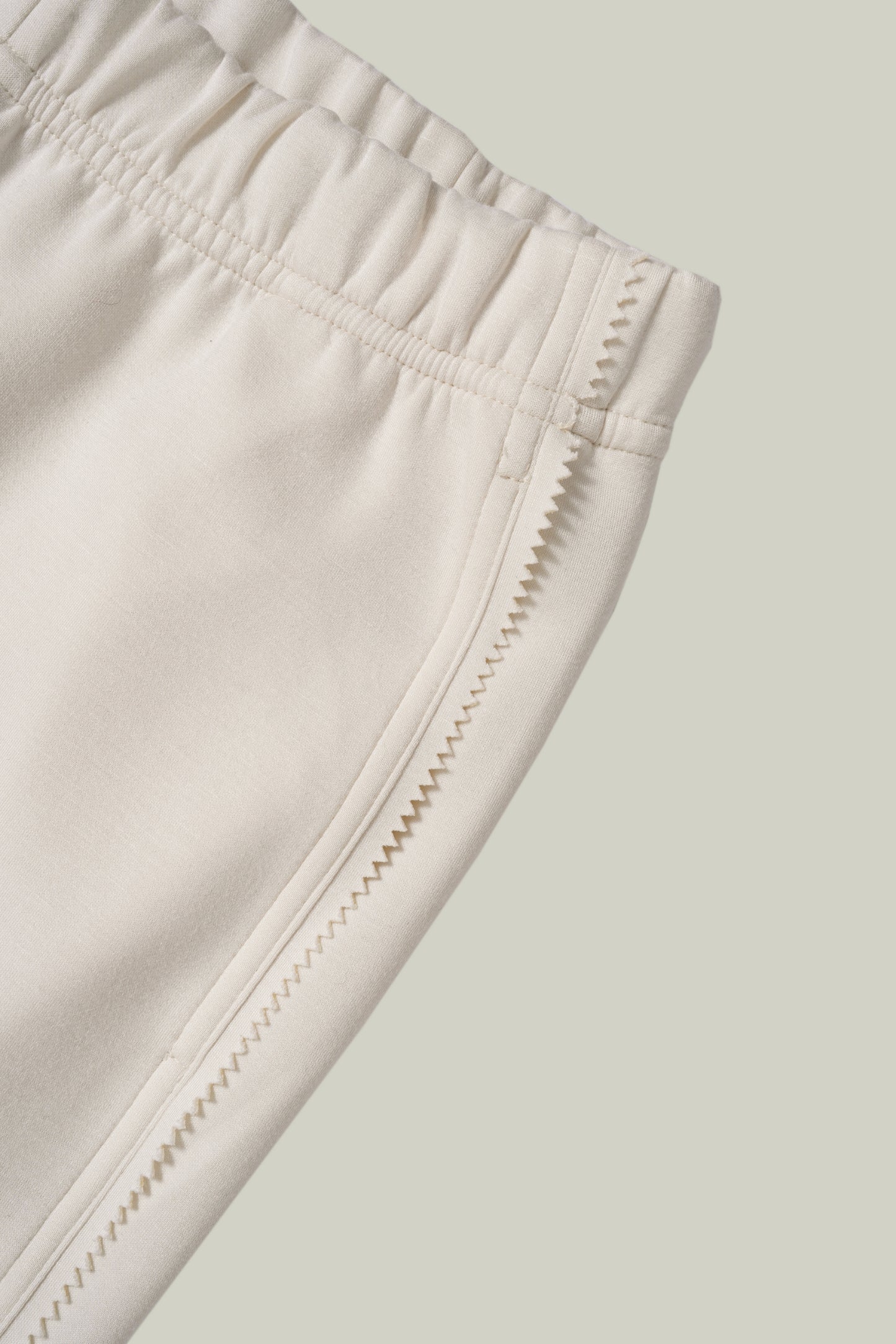 Artisanal lace cuff sweatshirt and straight-leg pants set