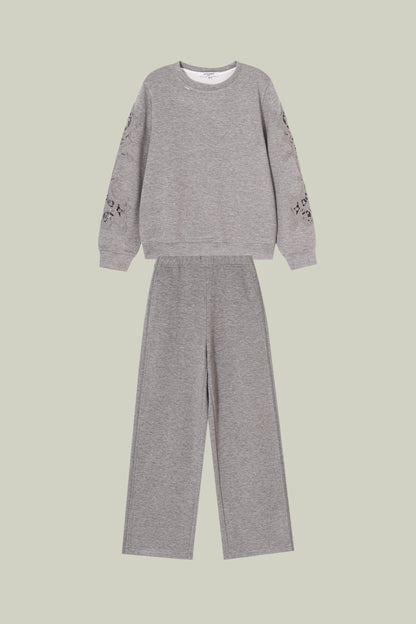 Artisanal lace cuff sweatshirt and straight-leg pants set