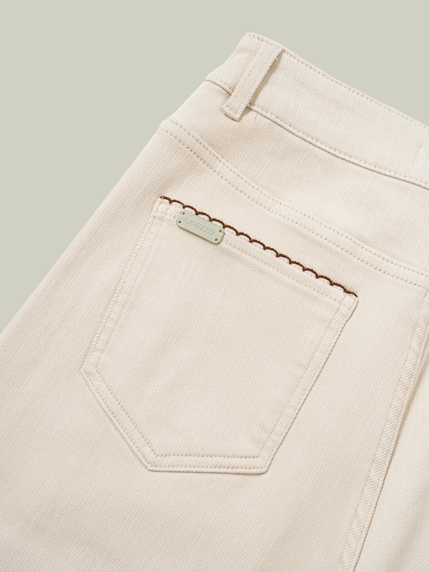 High-waisted embroidered cuffed jeans