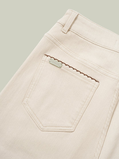 High-waisted embroidered cuffed jeans