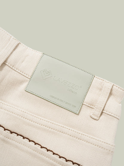 High-waisted embroidered cuffed jeans