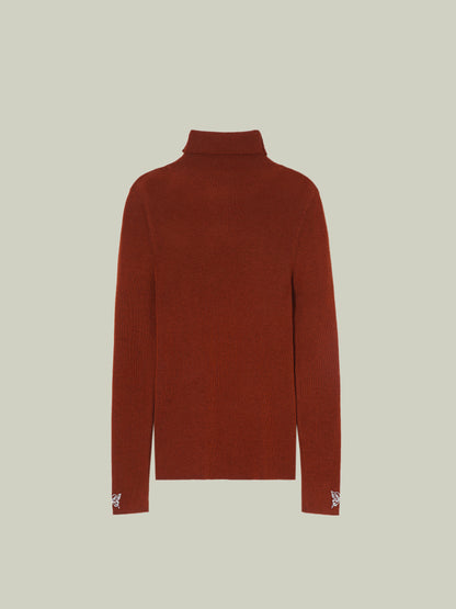 Butterfly embellished high-neck knit