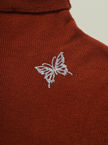 Butterfly embellished high-neck knit