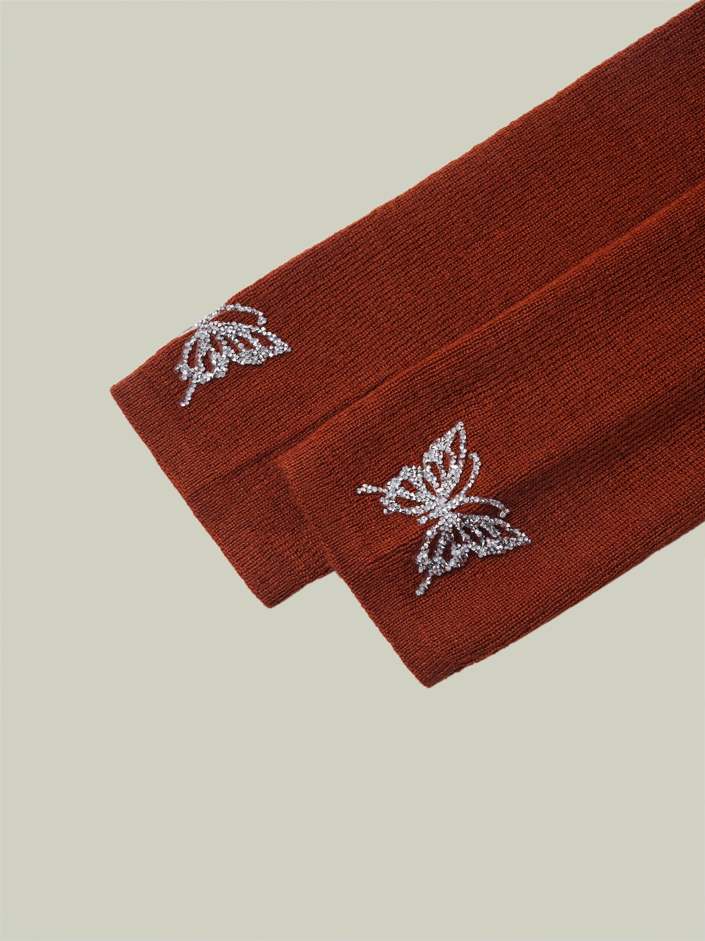 Butterfly embellished high-neck knit