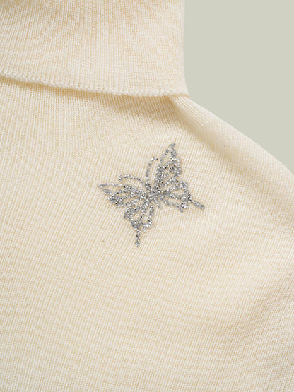 Butterfly embellished high-neck knit