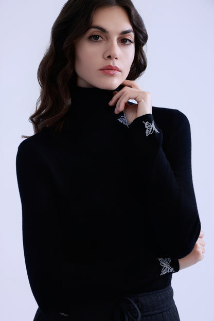 Butterfly embellished high-neck knit