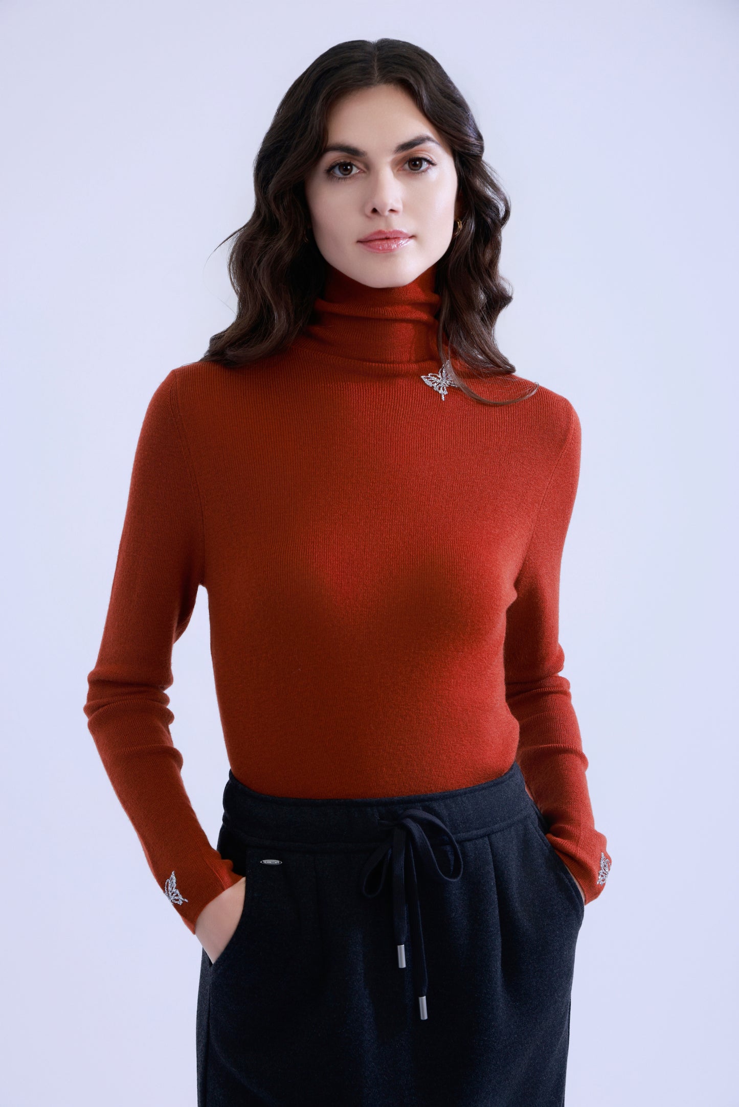 Butterfly embellished high-neck knit