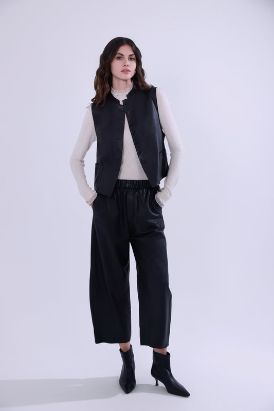 Pantaloni balloon in pelle conciata al vegetale