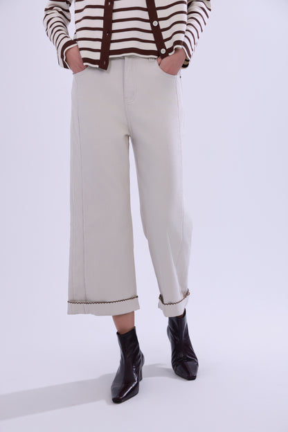High-waisted embroidered cuffed jeans