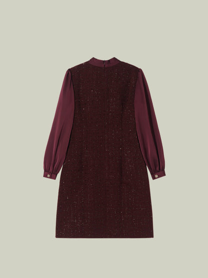 Abito in tweed bouclé dal taglio Chanel