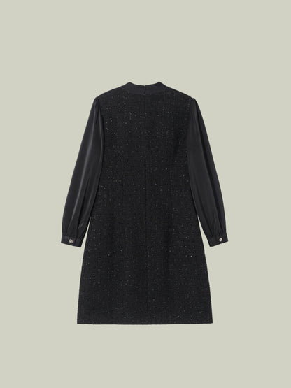 Abito in tweed bouclé dal taglio Chanel