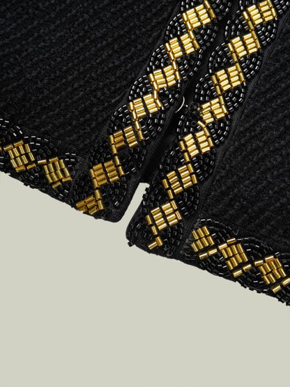 Wool jacket with gold beaded trim