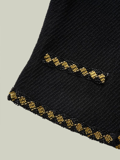 Wool jacket with gold beaded trim